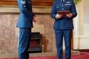 Former Ilkley Grammar School student, Sgt George Denman, left, is presented with an RAF award by Air Vice Marshal Stuart Atha