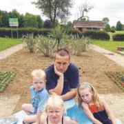 Dismayed: Richard Boxall with his children Molly, Joanna and Matthew
