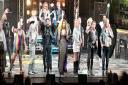 Cast of Rock of Ages on stage.