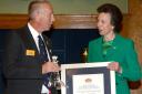 Princess Anne awards lifeboat coxswain Paul Legendre