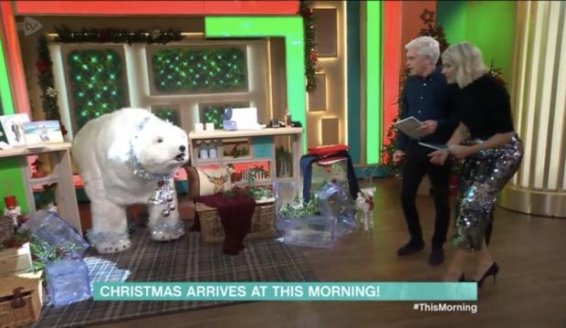Redhill And Reigate Life: Holly and Phillip explore the christmas decorations in the This Morning studio. Credit: ITV