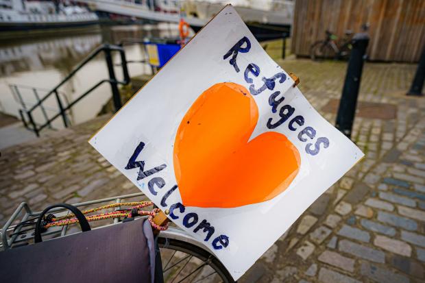 Redhill And Reigate Life: Refugees welcome sign. Credit: PA