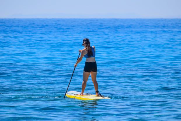 Redhill And Reigate Life: A person paddleboarding (Canva)