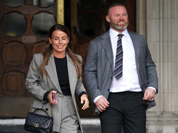 Redhill And Reigate Life: Coleen and Wayne Rooney leave the Royal Courts Of Justice, London. Picture: PA