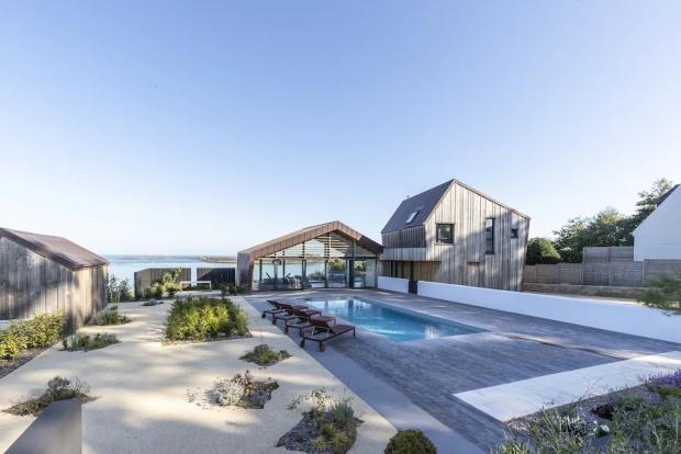 Redhill And Reigate Life: Modern villa with stunning sea views, swimming pool, Jaccuzi - Brittany, France. Credit: Vrbo