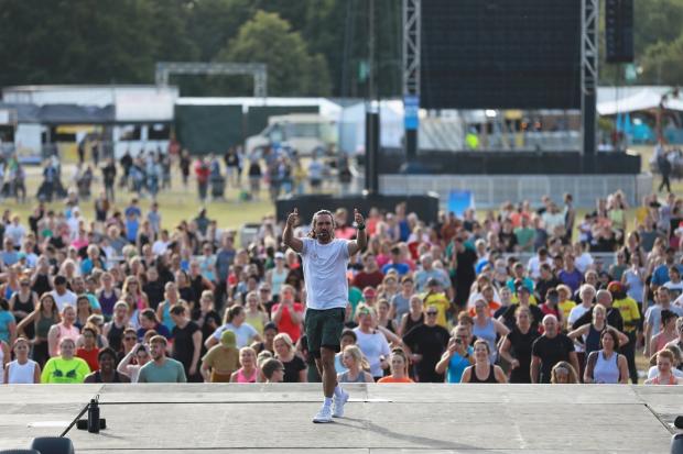Redhill And Reigate Life: Last week Joe Wicks lead a record breaking attempt for the largest HIIT Workout at BST Hyde Park, London. Picture: PA