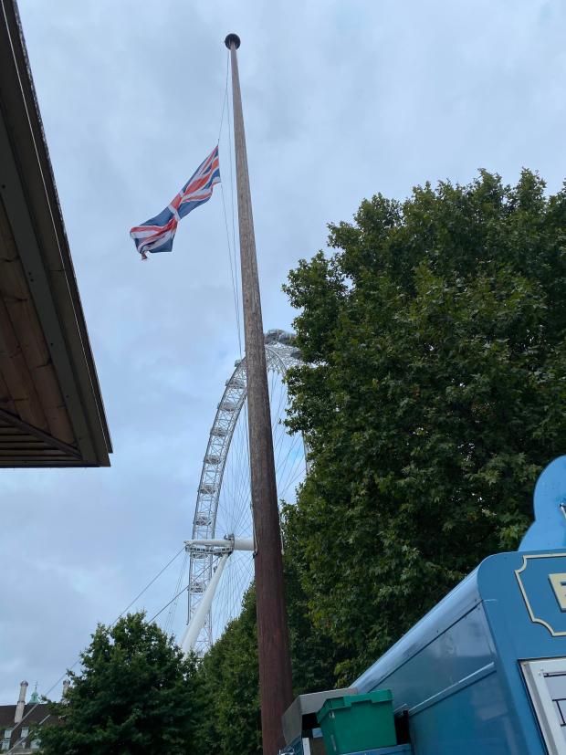 Redhill And Reigate Life: A large Union Flag flew at half-mast near the London Eye along the queue route