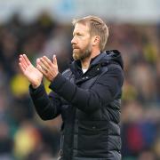Brighton and Hove Albion manager Graham Potter applauds the fans after the Premier League match at Carrow Road, Norwich. Picture date: Saturday October 16, 2021..