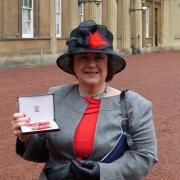 Barbara at Buckingham Palace with her MBE