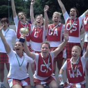 Redhill Netball Club celebrate their triumph at Bournemouth