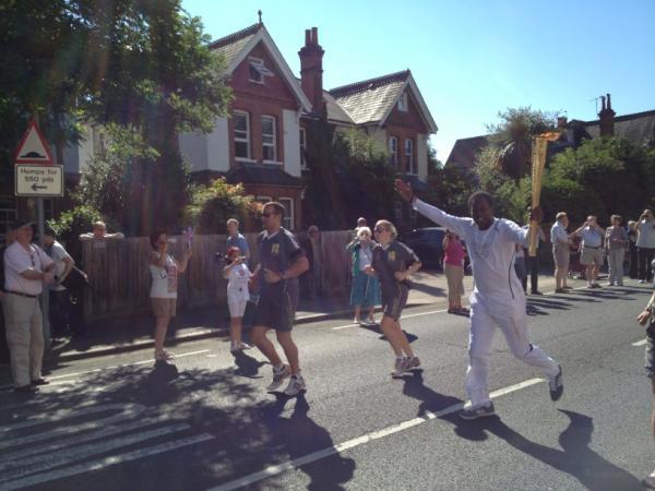 Olympic torch is carried along Richmond Road in Kingston