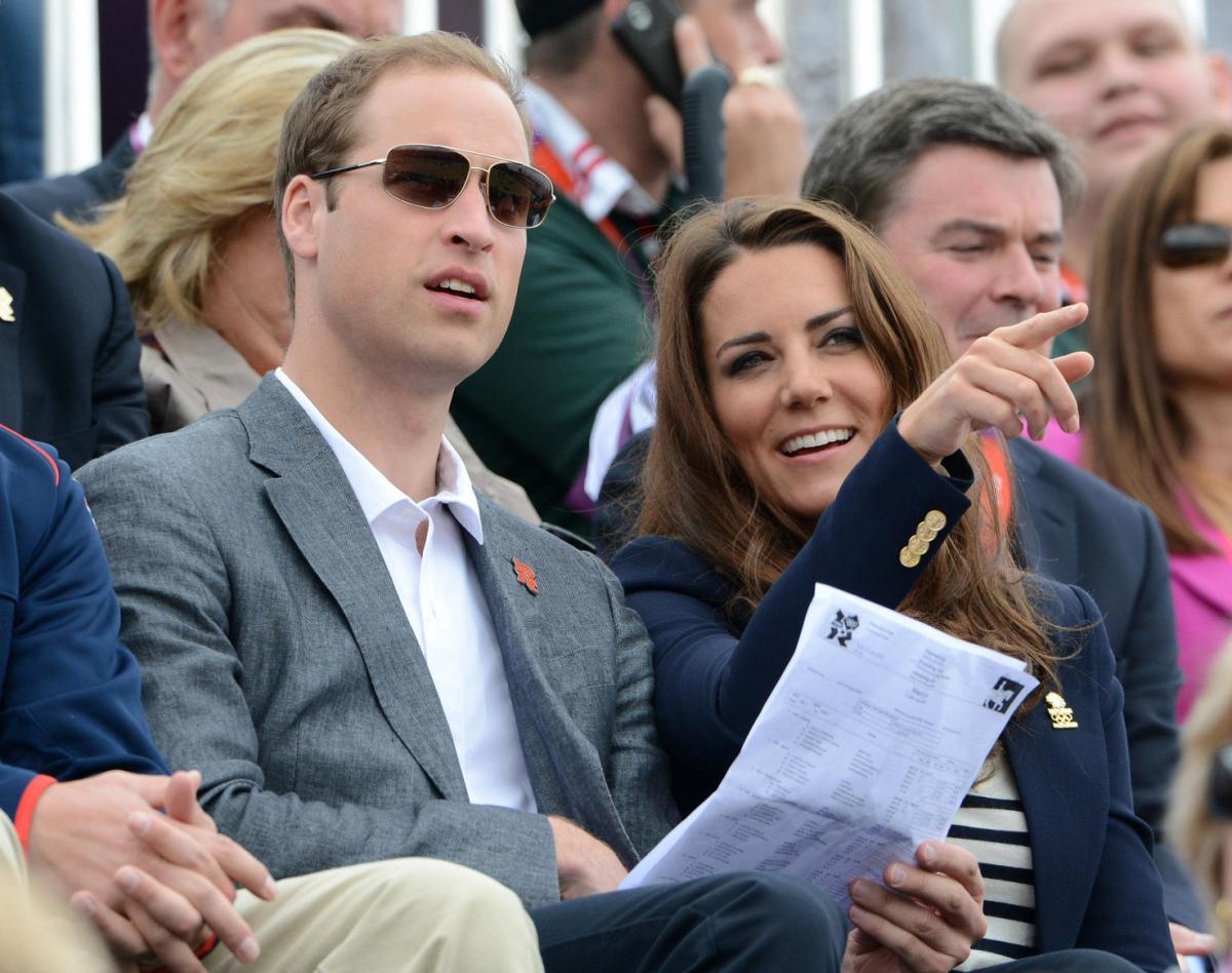 Duke and Duchess of Cambridge watch the Team Eventing Jumping Final on day four of the London Olympic Games at Greenwich Park. Photo: Owen Humphreys/PA.