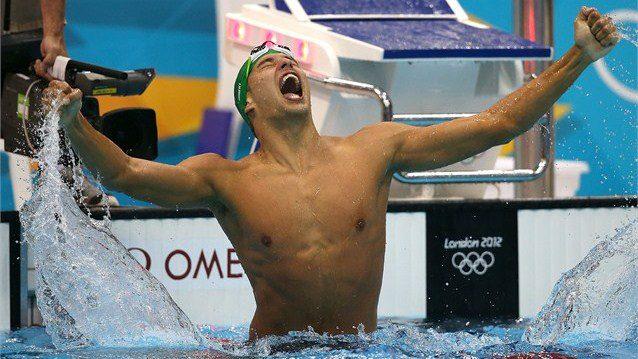 South African Chad le Clos shows his emotion after his narrow win over American Michael Phelps for gold in the men's 200m Butterfly final on Day 4 of the London 2012 Olympic Games at the Aquatics Centre... 