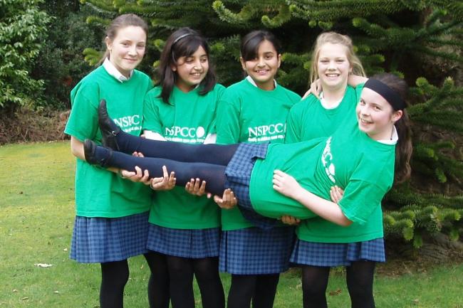 Dunottar School pupils Rachel Clement, Tabitha Pearson, Noshin Hussain and Ella Faulkner give Zoe Ross a lift.